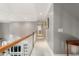 Upstairs hallway with neutral paint, crown molding, and carpet at 3440 Black Bear Cv, Burlington, NC 27215