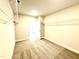 Walk-in closet with carpeted floors and metal shelving at 356 Bishop Ln, Sanford, NC 27330