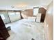 Spacious garage with overhead door, side door, and room for storage or parking with freezer at 3605 Mine Creek Rd, Burlington, NC 27217