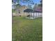 Backyard features a single carport and green grass at 432 N Mercer N St, Rocky Mount, NC 27801