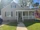 Charming single-story home with a welcoming front porch and well-maintained landscaping at 432 N Mercer N St, Rocky Mount, NC 27801