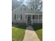 Charming single-story home with a welcoming front porch and well-maintained landscaping at 432 N Mercer N St, Rocky Mount, NC 27801