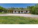 Charming home featuring a covered porch with rocking chairs, perfect for relaxing outdoors at 435 Salt And Light Ln, Henderson, NC 27537