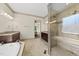 Beautiful bathroom with tiled floors, double vanity and a large glass shower at 5009 Coe Hill Pl, Cary, NC 27519