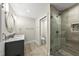 Bathroom with a glass shower, vanity with sink, and toilet in separate room at 5009 Coe Hill Pl, Cary, NC 27519