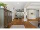 Spacious living room with hardwood floors, coffered ceilings, and bright, open design at 5009 Coe Hill Pl, Cary, NC 27519