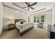 Spacious main bedroom with tray ceiling and ample natural light at 5009 Coe Hill Pl, Cary, NC 27519