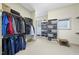 Spacious walk-in closet with ample storage shelving and hanging areas at 5009 Coe Hill Pl, Cary, NC 27519