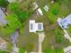 Aerial shot of house with solar panels, expansive yard and established trees at 5144 Jeffries St, Raleigh, NC 27606