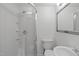 Clean bathroom features a new shower, updated sink, updated mirror, and modern toilet at 5144 Jeffries St, Raleigh, NC 27606