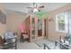 Relaxing bedroom features a sauna, stylish seating, updated lighting, and backyard views at 5144 Jeffries St, Raleigh, NC 27606