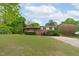 Well maintained brick home with an inviting front porch and mature landscaping at 5144 Jeffries St, Raleigh, NC 27606