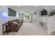 Bright living room features a comfortable sofa, large window, and stylish decor at 5144 Jeffries St, Raleigh, NC 27606