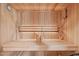 Relaxing in-home sauna with wooden interior and seating for ultimate wellness and comfort at 5144 Jeffries St, Raleigh, NC 27606
