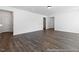 Spacious living room with hardwood floors, recessed lighting, and neutral paint at 517 W Brocklyn St # 63P, Benson, NC 27504