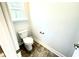 Toilet room features a toilet, neutral paint and tile flooring at 538 Middleton Ct, Sanford, NC 27330
