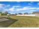 Large backyard featuring well-maintained lawn and a view of the neighborhood at 5525 Garnet Meadow Rd, Knightdale, NC 27545
