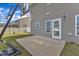 Backyard featuring an installed basketball hoop and a view of the home's siding at 5525 Garnet Meadow Rd, Knightdale, NC 27545