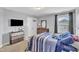Bedroom with a large window and carpeted floor at 5525 Garnet Meadow Rd, Knightdale, NC 27545