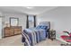 Bedroom with a large window and carpeted floor at 5525 Garnet Meadow Rd, Knightdale, NC 27545
