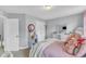 Bedroom with plush carpet, closet, and an abundance of soft toys at 5525 Garnet Meadow Rd, Knightdale, NC 27545