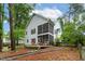 Charming backyard featuring a screened porch, deck, and landscaped yard at 6 Chelan Ct, Durham, NC 27713
