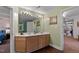Bathroom featuring double sinks and wooden cabinetry at 6 Chelan Ct, Durham, NC 27713