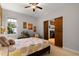 Cozy bedroom featuring a light walls and flooring, and a view of the fire place through the doorway at 6 Chelan Ct, Durham, NC 27713