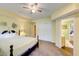 Bright bedroom with a view to living area, closet, and inviting decor, perfect for relaxing and unwinding at 6 Chelan Ct, Durham, NC 27713