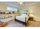 Serene bedroom featuring cozy carpet, built in shelving, and natural light, creating a relaxing retreat at 6 Chelan Ct, Durham, NC 27713