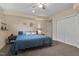 Comfortable bedroom featuring a queen bed and ensuite closet at 6 Chelan Ct, Durham, NC 27713