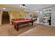 Game room with pool table and laundry area at 6 Chelan Ct, Durham, NC 27713