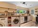 Laundry room with ample counter space and storage at 6 Chelan Ct, Durham, NC 27713