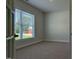 Carpeted bedroom with natural light, offering comfort and calm at 600 Sweet Potato Lane # 38, Nashville, NC 27856