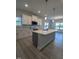 Bright and airy kitchen featuring a large island and modern stainless steel appliances at 600 Sweet Potato Lane # 38, Nashville, NC 27856