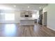 Modern kitchen with a large island, stainless steel appliances, and sleek countertops at 600 Sweet Potato Lane # 38, Nashville, NC 27856