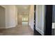 Bright living room featuring wood-look flooring, large windows, and neutral paint at 600 Sweet Potato Lane # 38, Nashville, NC 27856