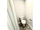 Powder room shows toilet with hardware at 606 Melrose Ct, Sanford, NC 27330