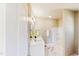 Modern bathroom with dual sinks, marble floors, and a shower-tub combination at 6715 Princeton Kenly Rd, Princeton, NC 27569