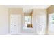 Charming bedroom offers a window seat between two closets, perfect for storage and relaxation at 6715 Princeton Kenly Rd, Princeton, NC 27569