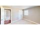 Bedroom with carpet, large closet, and a window at 6715 Princeton Kenly Rd, Princeton, NC 27569