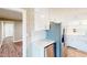 The bright kitchen has stainless appliances, white cabinets, and modern backsplash at 6715 Princeton Kenly Rd, Princeton, NC 27569