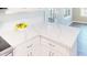 Stylish kitchen featuring quartz countertops, white cabinetry, and new flooring and fixtures for a cohesive, modern design at 6715 Princeton Kenly Rd, Princeton, NC 27569