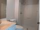Bathroom featuring an enclosed shower, toilet and sink with vanity at 710 E Azalea Ct, Fuquay Varina, NC 27526