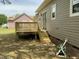 Wooden deck off the side of the house, accessible from the back doors at 717 Papsworth Ct, Fuquay Varina, NC 27526
