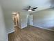 Bright bedroom with wood flooring and a ceiling fan at 717 Papsworth Ct, Fuquay Varina, NC 27526