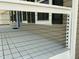 Porch with horizontal cable railings and black shutters, providing a welcoming curb appeal at 717 Papsworth Ct, Fuquay Varina, NC 27526