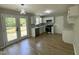 Modern kitchen featuring stainless steel appliances and access to the backyard at 717 Papsworth Ct, Fuquay Varina, NC 27526