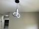 Modern lighting fixture adds a stylish touch to the living room area at 717 Papsworth Ct, Fuquay Varina, NC 27526