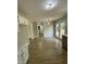 Spacious living room with wood flooring and access to a patio at 717 Papsworth Ct, Fuquay Varina, NC 27526